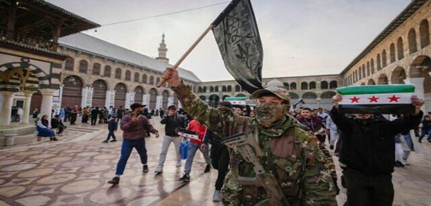 Fighter_Hayat_Tahrir_al-Sham_AP_Hussein_Malla