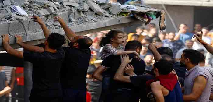 Gaza_Citizens_Rescuing_Fellow_Gazans_Reuters_Ibraheem_Abu_Mustafa