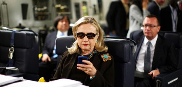 Hillary Clinton with Blackberry