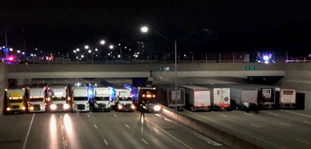 Truckers_Line_up_Under_Bridge