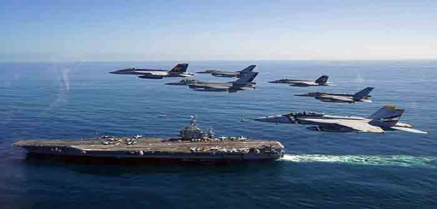 US_Navy_and_Chilean_aircraft_over_USS_George_Washington_